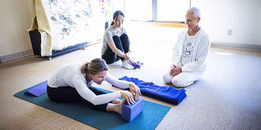 How do I become a yoga teacher at Alpha Yoga school?