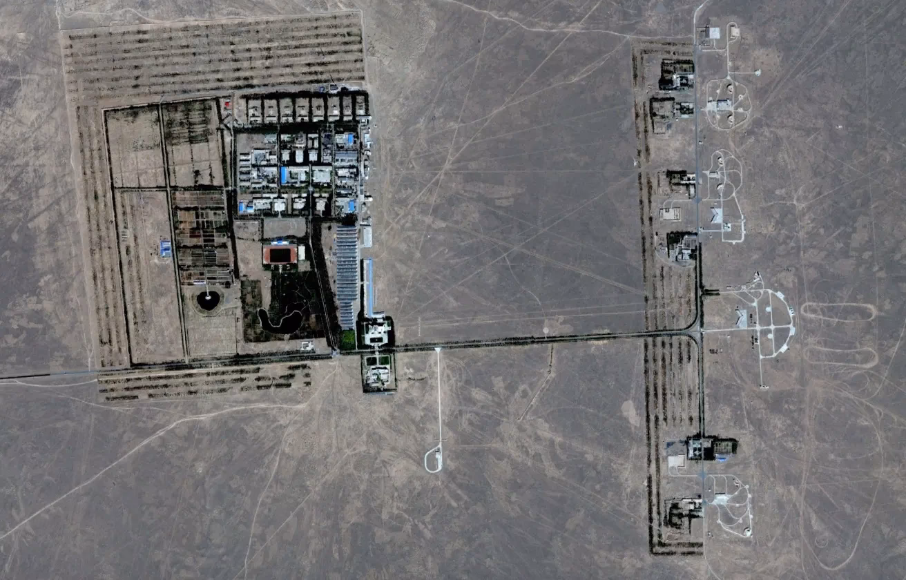 What types of aircraft are at Dingxin test & training base?