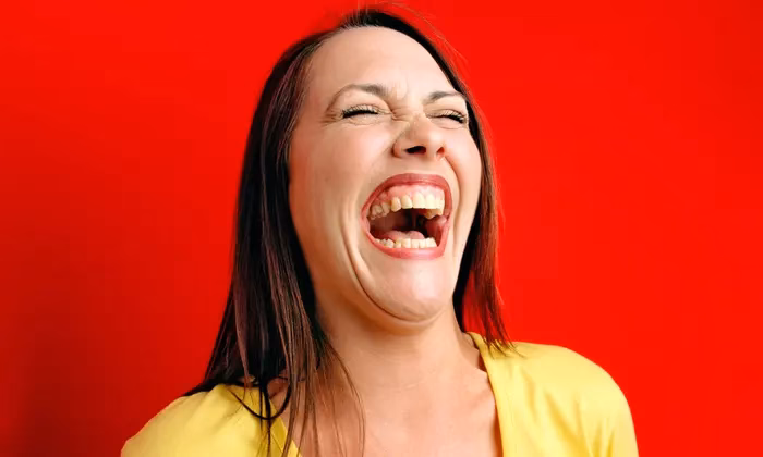 What does in fits of laughter mean?