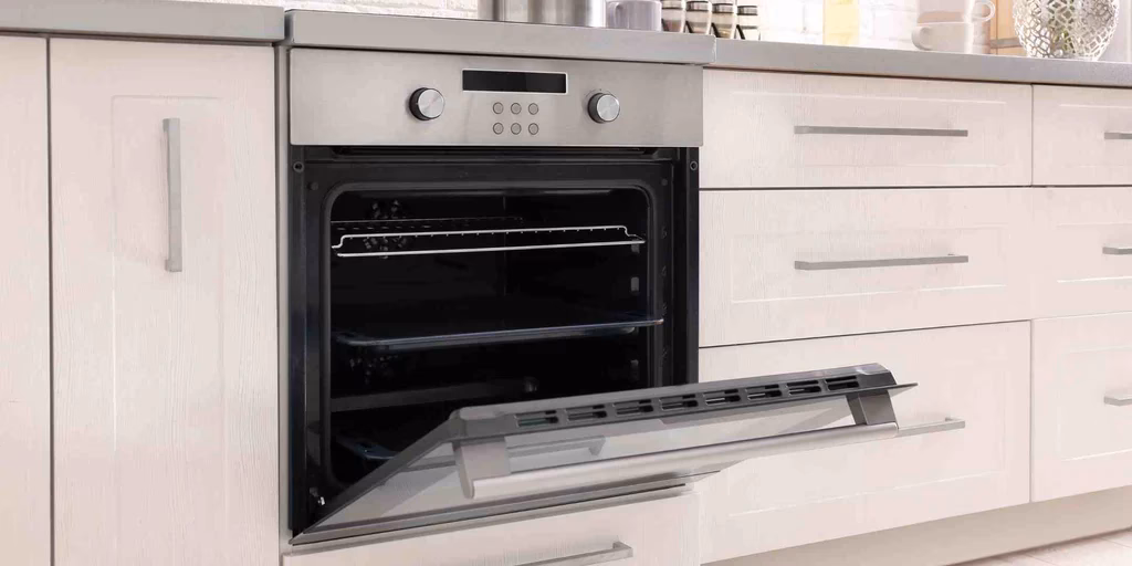 Can a built-in oven be installed in an existing cabinet?
