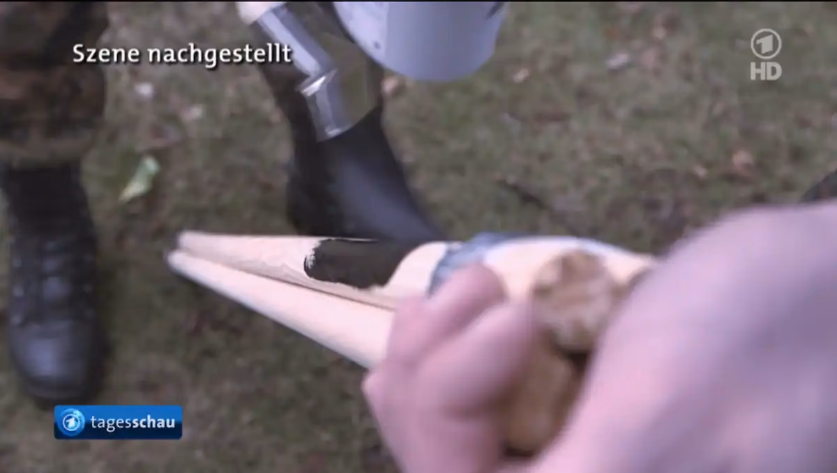Did German tank unit use broomsticks as mock weapons?