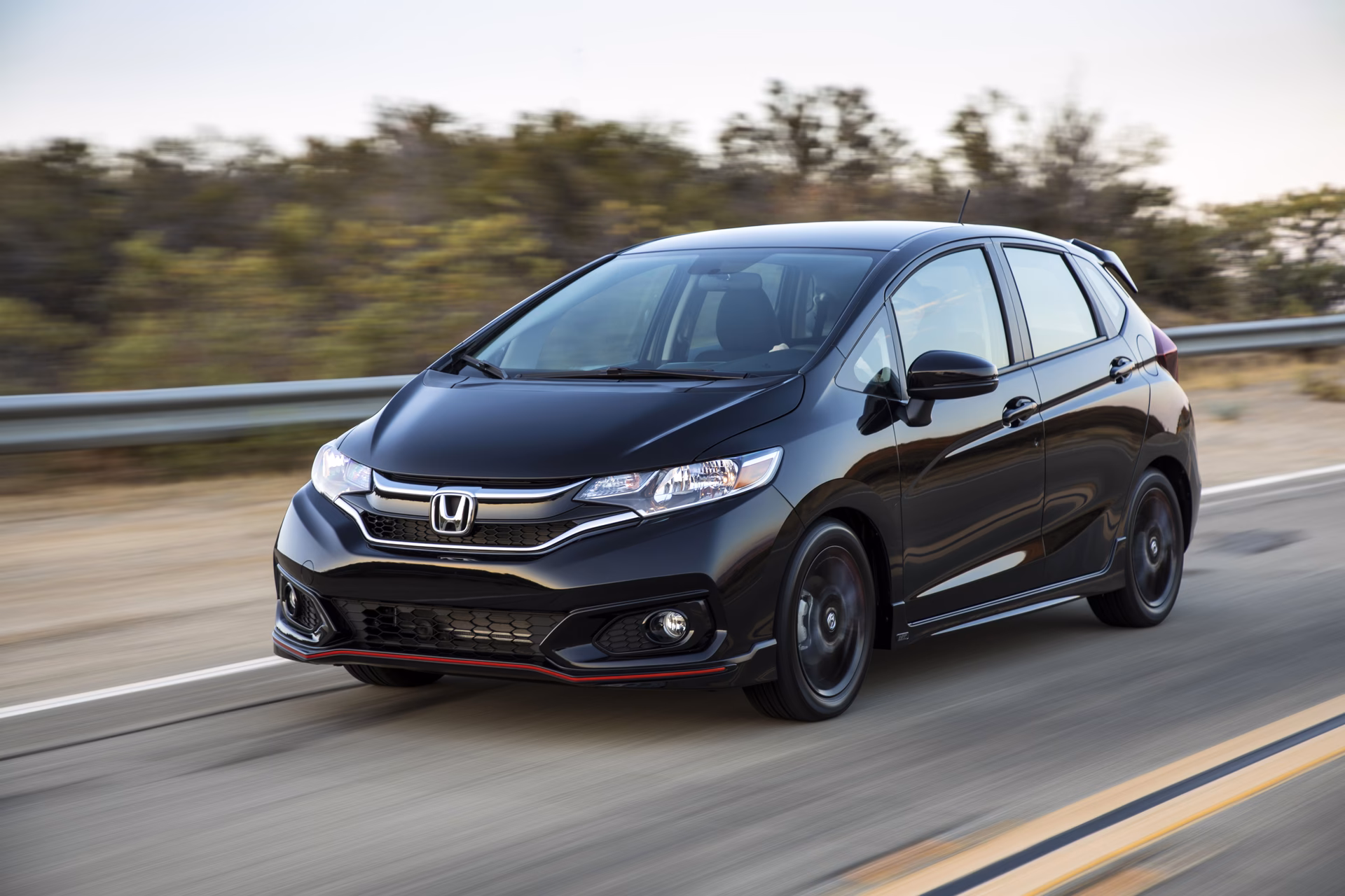 What is the difference between Honda Fit EX & LX?