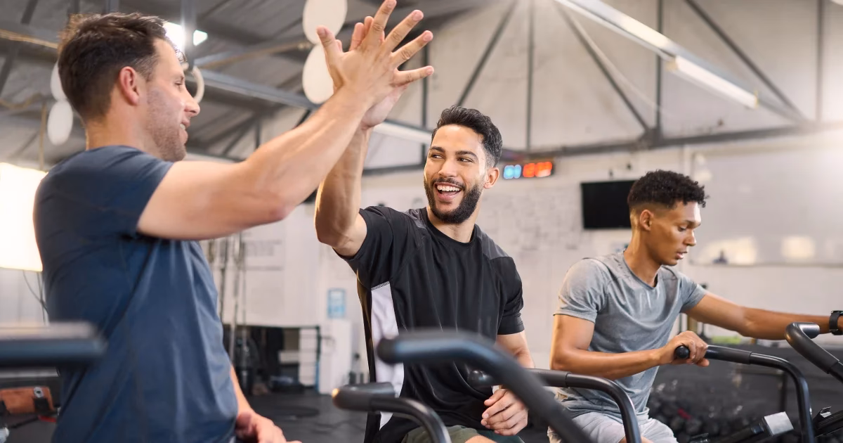 How do fitness trainers impact clients' motivation?