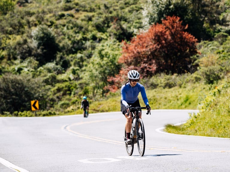 How much time do professional cyclists spend in the saddle?