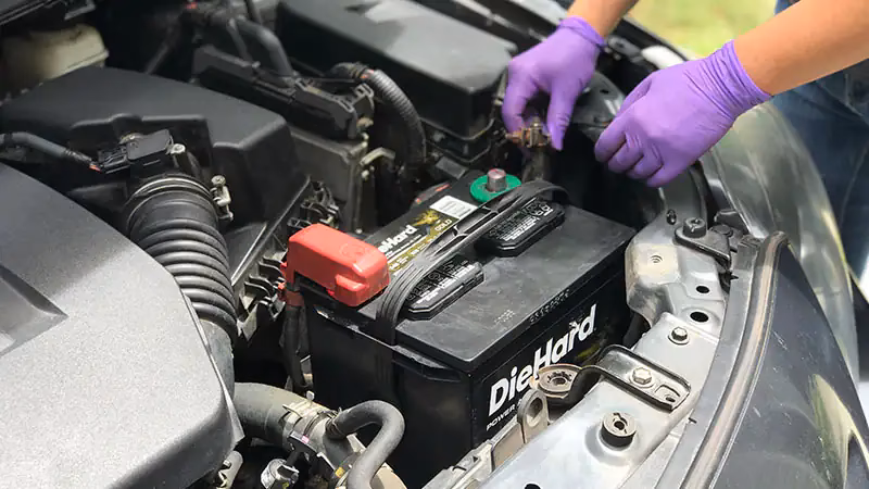 How do you restraining a car battery?