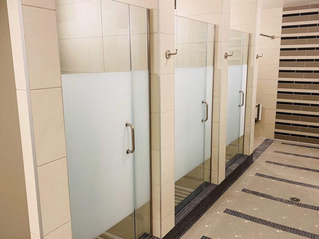 What size shower stall does LA Fitness offer?