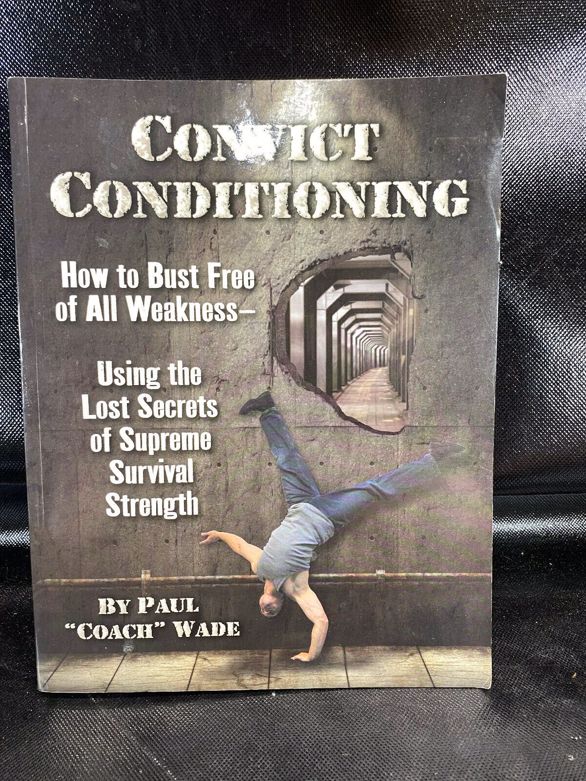 Does coach Paul Wade have a book on bodyweight conditioning?