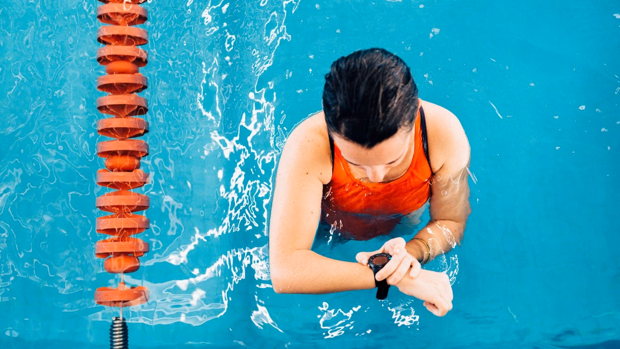 How do I choose a swimming-friendly fitness tracker?