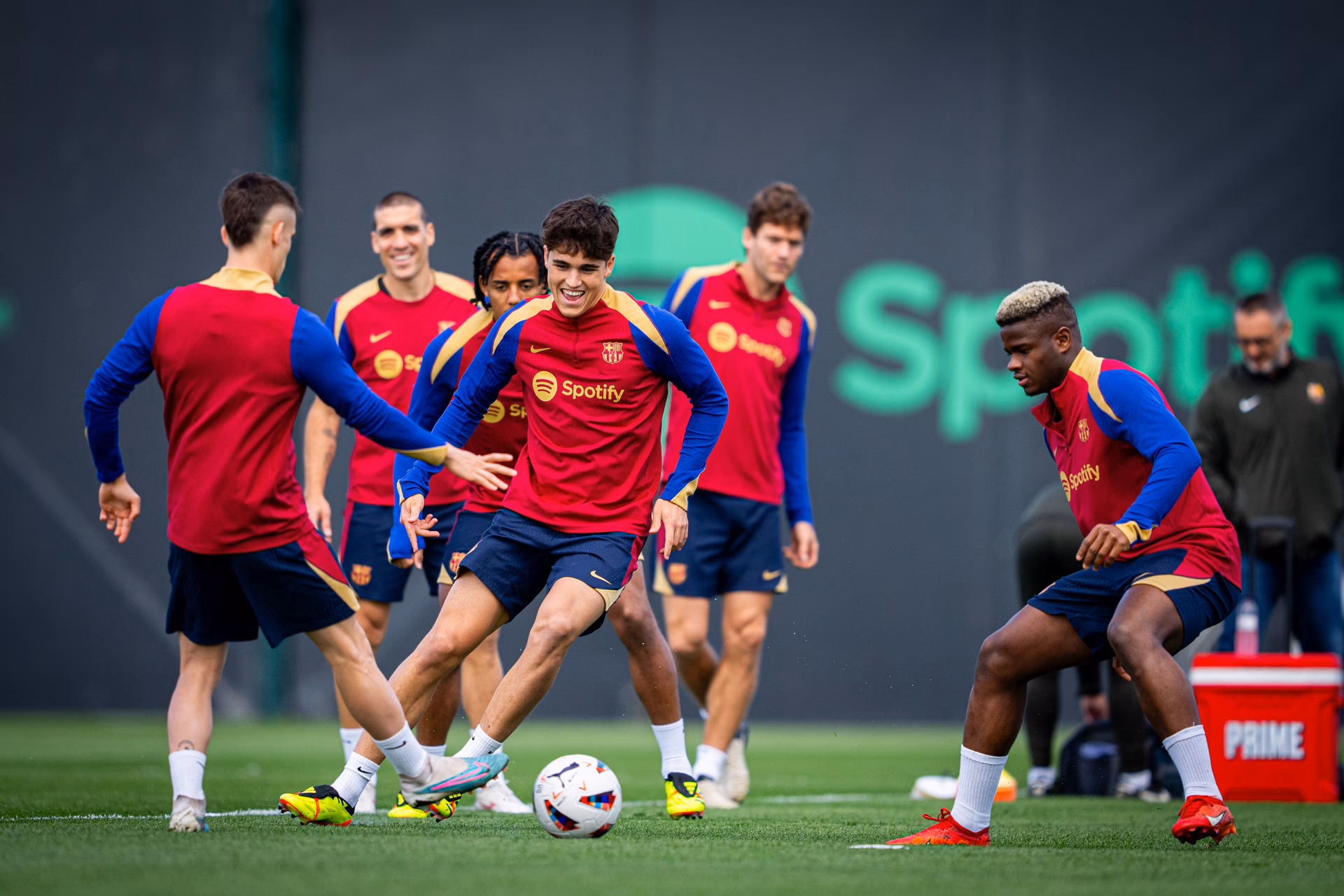 How do I register for FC Barcelona camps?