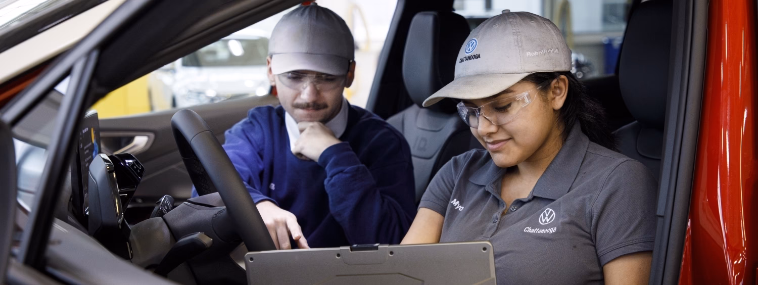 How is staff training organized at Volkswagen?